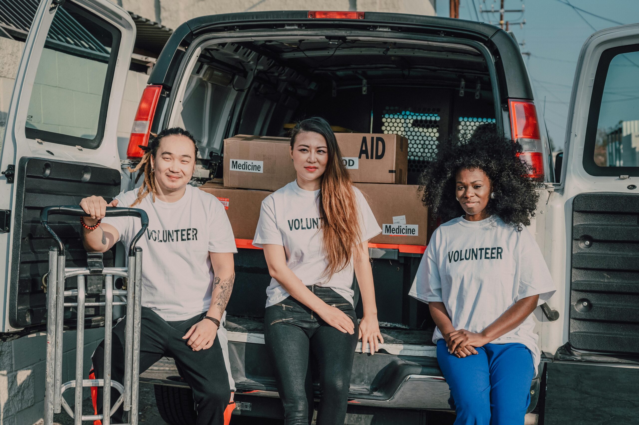 Volunteers representing the Shoelancer Give Back Day mission to donate restored shoes to families in need